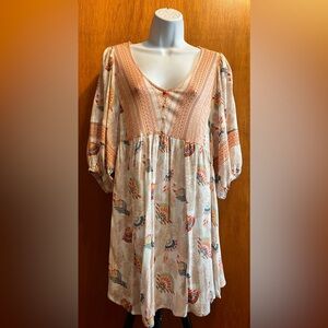 Boutique style tunic by GiGio size medium. Peach bohemian print multicolor NWOT